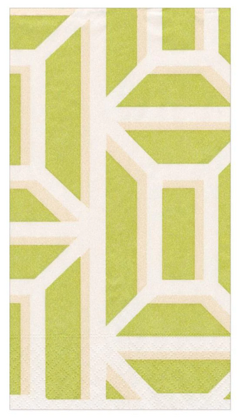 A patterned rug with geometric designs in lime green and white colors, accompanied by Caspari Garden Gate Paper Linen Guest Towel Napkins in Grass.