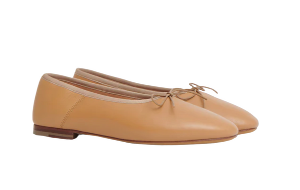 A pair of Mansur Gavriel Dream Ballerina with a small bow on top, crafted from luxurious Italian lambskin leather.