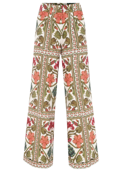 Lug Von Siga Maria Pant with a high rise, featuring a floral and geometric pattern in shades of red, green, and beige, and equipped with convenient side pockets by Lug Von Siga.