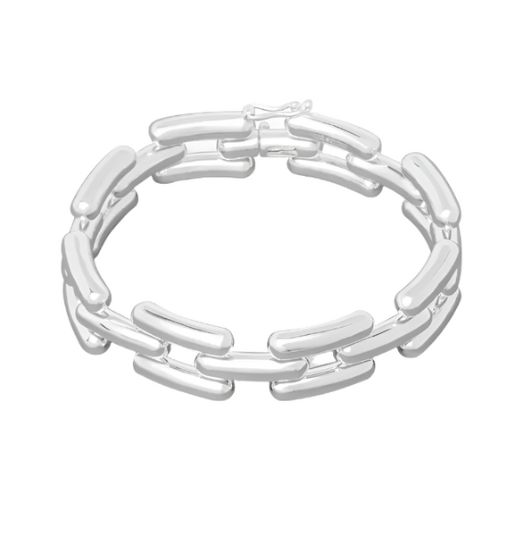 The LIÉ STUDIO Freya Bracelet by Lie Studio is a sterling silver bracelet featuring a series of elongated, curved rectangular links connected in a continuous loop.