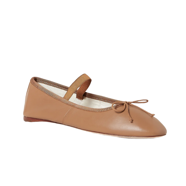 The Loeffler Randall Leonie Soft Ballet Flat, crafted from supple calf leather in a tan shade, features a rounded toe, a charming bow detail on the front, and an elastic strap across the top. Its padded footbed ensures all-day comfort.