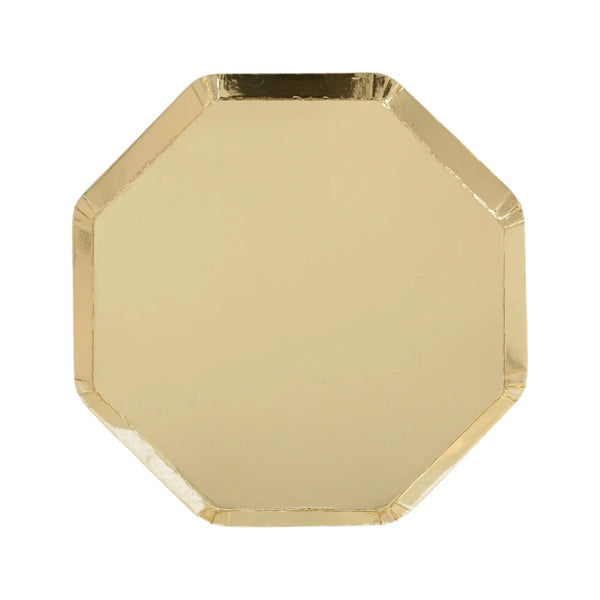 A Meri Meri Gold Side Plate, styled with a reflective gold surface and an elegant octagonal shape, is featured against a plain background.