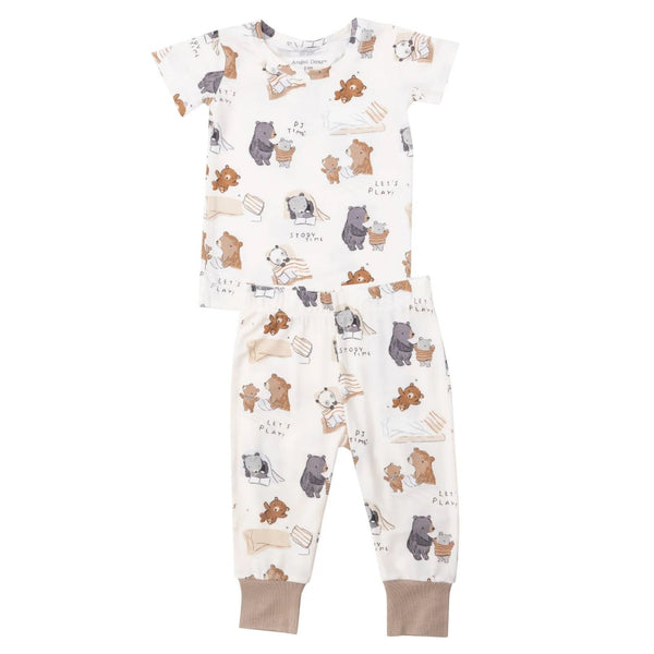 The Angel Dear Short-Sleeve Loungewear Set by Angel Dear is a child's pajama set with a short sleeve top and pants, adorned with bear and sloth illustrations along with text reading "Let's Play" and "Story Time." Crafted for sensitive skin, these soft pajamas feature light brown cuffs on the pants.