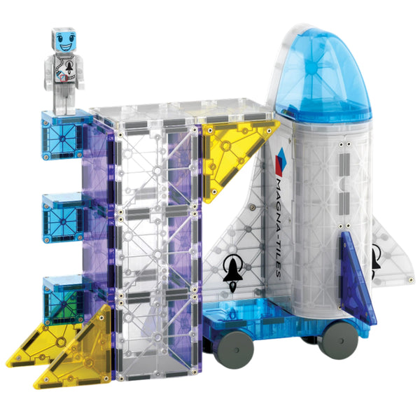 A STEAM-centric toy featuring the MAGNA-TILES® Space 32-Piece Set by Magnatiles, with colorful geometric tiles and a smiling astronaut figure on a platform.