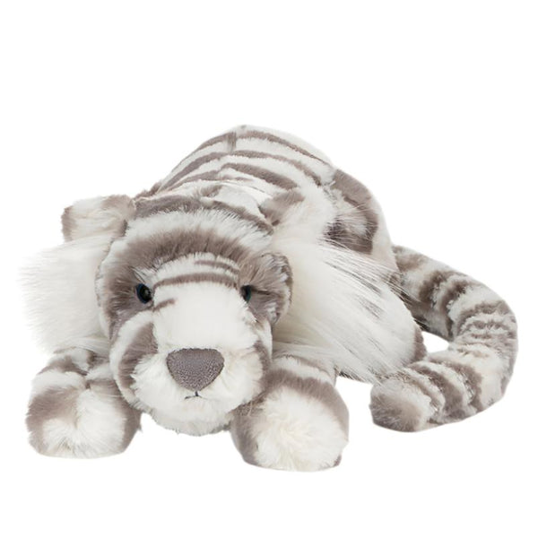 A Jellycat Sacha Snow Tiger, Little plush toy in gray and white stripes, lying down and facing forward.