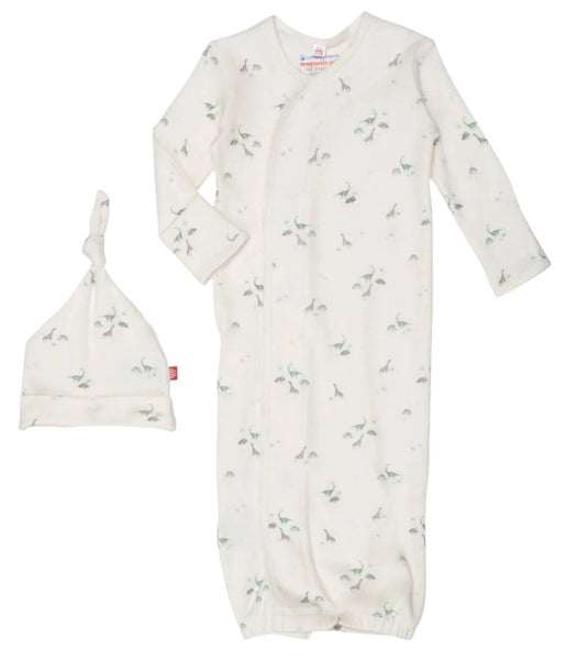 Magnetic Me Tiny Diny Gown and Hat Set, featuring a dinosaur print on white fabric, made from organic cotton baby clothes by Magnetic Me.