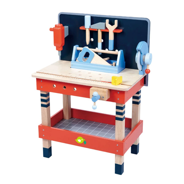 The Tenderleaf Tool Bench by Tender Leaf Toys is a wooden kids' workbench that includes a charming carpenter tool set featuring toy tools such as a wrench, hammer, and saw, all neatly organized on the tabletop and attached board.