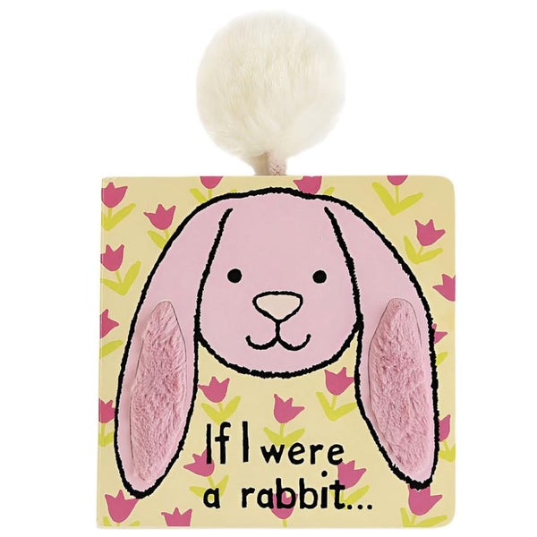 The Jellycat "If I Were A Rabbit" book by Jellycat is a charming yellow and pink children’s book featuring a drawn bunny face, with soft, floppy ears and a fluffy white pom-pom tail on top—perfect for bedtime storytelling.