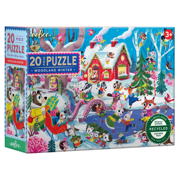 The eeboo Woodland Winter 20 Piece Puzzle by Eeboo is a delightful children's holiday jigsaw puzzle featuring animals engaged in festive activities within a snowy forest. Made from sustainably sourced materials, it is suitable for ages 3 and up.