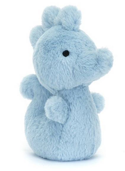 A small, blue stuffed animal with an upright posture featuring a round body, short limbs, and a simple face with black eyes and nostrils. This Jellycat Fluffy Seahorse from Jellycat has the charm of a detailed plush, perfect for cuddles.