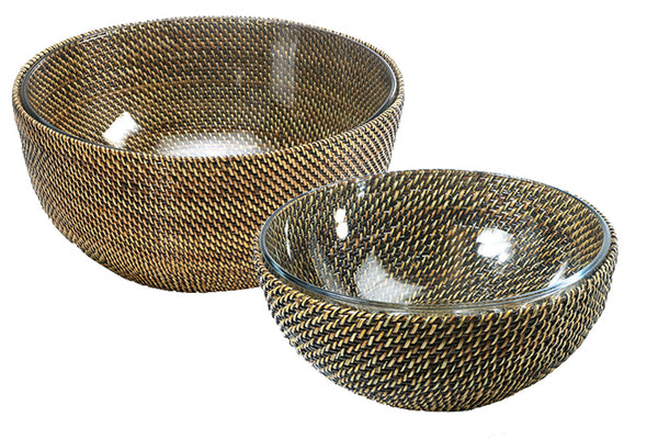 The Calaisio Round Bowl Collection by Calaisio features two glass serving bowls with a textured, woven-like pattern on the exterior. Ideal for house entertaining, the larger bowl is placed at the back while the smaller bowl is positioned in front.