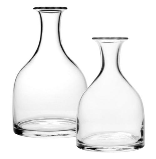 Two clear decanters from the William Yeoward Crystal Classic Carafe Collection, featuring wide bases and narrow necks, are displayed against a white background. This elegant glassware by William Yeoward Crystal is ideal for both everyday and formal use, making it perfect as wine carafes.