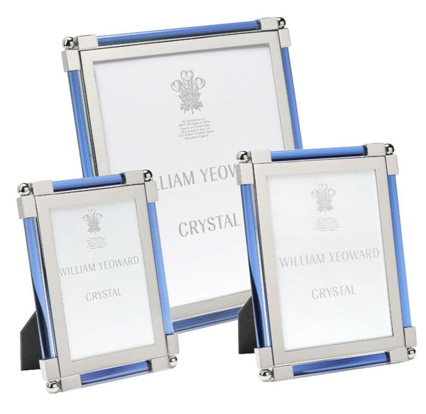 Three frames from the William Yeoward Crystal Classic Frame, Light Blue Collection, featuring a nickel-plated finish and variably sized silver and light blue designs, with the brand name "William Yeoward Crystal" engraved on each frame, positioned against a white background.