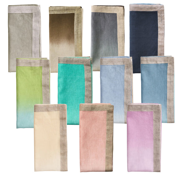 The Kim Seybert Dip Dye Napkin set by Kim Seybert includes four hand-dipped and dyed fabric napkins available in a range of hues such as blue, green, pink, and beige, each featuring a neutral-colored trim.