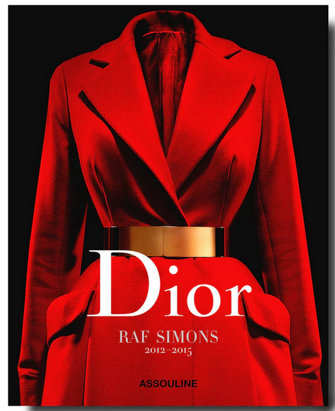 Cover of the book "Dior by Raf Simons 2012 - 2015" by Assouline, featuring a red coat with a gold belt on a black background—a must-have for fashion enthusiasts and admirers of haute couture.