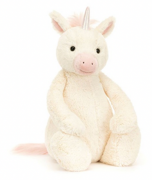 A soft, plush Jellycat Bashful Unicorn, Really Big toy with a white body, pink snout and hooves, a single holographic horn on its forehead, and souffle-soft fur.