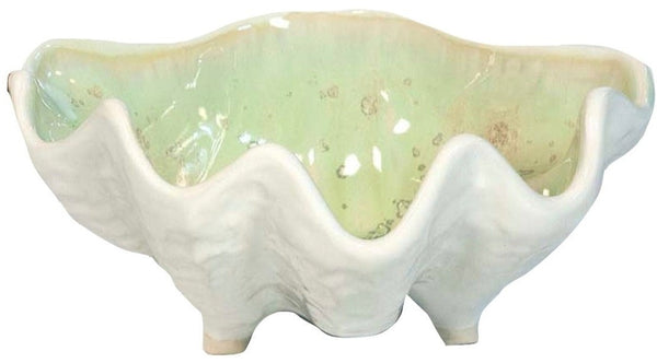 A AE Ceramics Small Clam Bowl with a glazed interior, perfect for oyster serving.