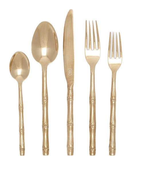 A flatware collection featuring the Blue Pheasant Liliana Bamboo 5 Piece Flatware Set, Polished Gold—teaspoon, tablespoon, knife, dinner fork, and salad fork—all adorned with bamboo-patterned handles for a sophisticated touch.