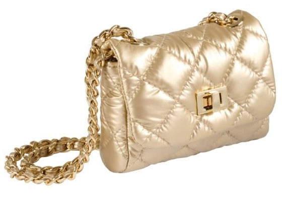 The Milledeux Small Gold Metallic Bag features a quilted design, a chain strap, and a sleek metal closure.