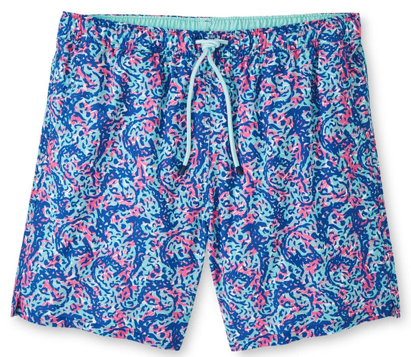 Peter Millar Hammerhead Camo Swim Trunk featuring an elastic waistband and drawstring. Made with quick-drying, four-way stretch fabric, the pattern boasts blue, green, and pink abstract prints.