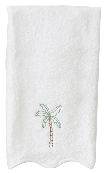 Introducing the Weezie Towels Palm Tree Scalloped Hand Towel by Weezie Towels – a white towel adorned with palm tree embroidery near the bottom center, exuding a touch of tropical elegance.