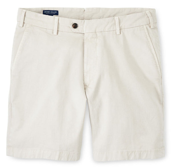 A pair of Peter Millar Concorde Garment-Dyed Shorts made from soft cotton with a button and zipper closure, belt loops, and front pockets.