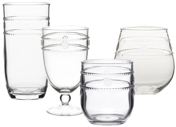 The Juliska Isabella Clear Acrylic Collection, offered by Juliska, features a variety of clear glassware in different shapes and sizes, each adorned with a decorative band around the top, making them the perfect complement to your Al Fresco Collection.