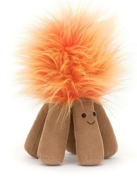 A Jellycat Amuseables Campfire by Jellycat with long, fluffy orange hair resembling ombre flames and a soft, brown, segmented base with embroidered eyes and a smile.