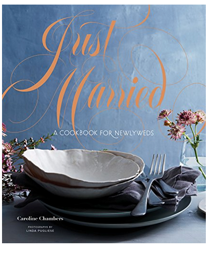 Cover of the book "Just Married: A Cookbook for Newlyweds" by Chronicle Books, featuring a rustic table setting with plates, silverware, and flowers — perfect for those seeking modern marriage cooking and recipes for couples.