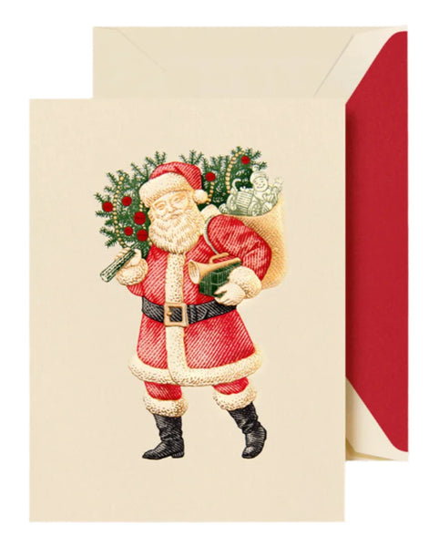 Introducing the Crane Classic Santa Card Set by Crane: This elegant Christmas card showcases an intricately engraved design of Santa Claus holding a scroll and carrying a gift-laden sack adorned with holly. An envelope completes this festive presentation, enhancing its Christmas charm.