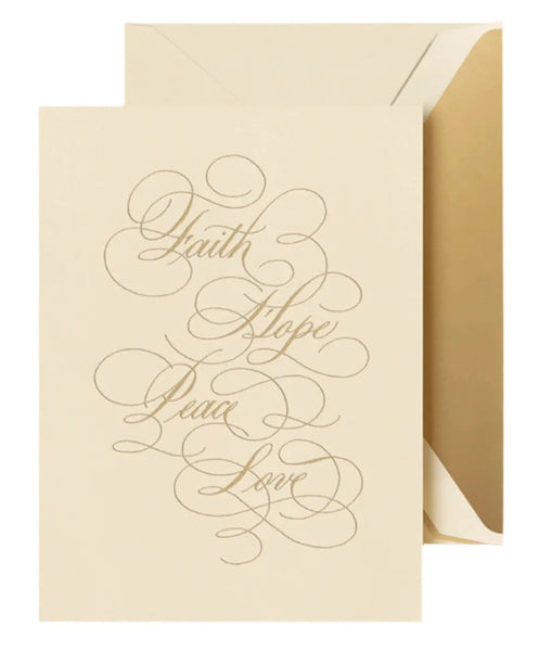 The Crane Faith Hope Peace Love Card Set features a beige holiday card adorned with cursive text that reads "Faith Hope Peace and Love," elegantly slipping from an open envelope, with its interior beautifully highlighted by a satin gold lining.