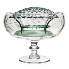 A decorative green wire mesh cage embellishes the William Yeoward Crystal Jasmine Footed Rose Bowl, a hand-engraved clear glass dessert dish featuring a Jasmine Vine pattern and mounted on a pedestal base.