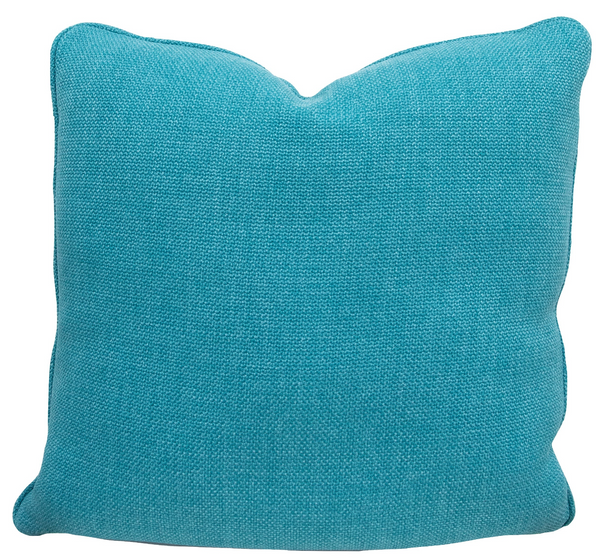 A square-shaped 22"x22" Guethary Lagon Outdoor Pillow by Associated Design, featuring a blue textured fabric surface, custom down-filled and handmade in the USA, placed against a plain background.