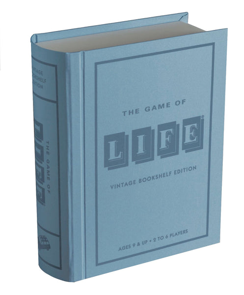 A blue box, styled to resemble a book and labeled "The Game of Life Vintage Bookshelf Edition" by WS Game Company, showcases vintage graphics and an elegant storage design. It is suitable for ages 9 and up and accommodates 2 to 6 players.