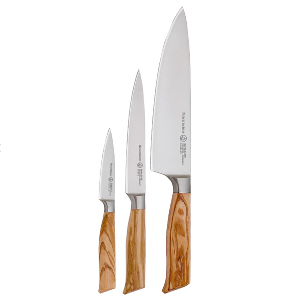 Arranged by size from smallest to largest, the trio of kitchen knives in the Messermeister Oliva Elite Knife Starter Set are crafted with wooden handles and exemplify the renowned Solingen craftsmanship.