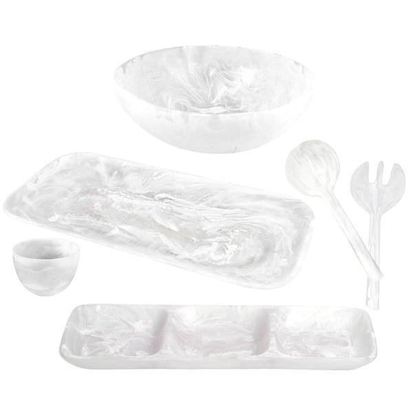 The Nashi Home White Serveware Collection from Nashi Home features a set of translucent white, marble-patterned kitchenware that is perfect for everyday entertaining. It includes a bowl, rectangular plates, a small cup, and serving utensils. These elegant pieces beautifully enhance any home decor when displayed against a crisp white background.