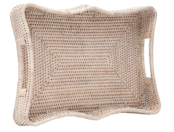 The Opal Tray, Small by Made Goods is a rectangular woven wicker tray featuring curved edges and handles on the shorter sides, accentuated with a beautiful scalloped-shape design.