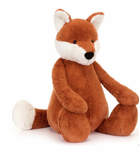 Introducing the Jellycat Bashful Fox Cub, Giant: a fluffy plush toy with a brown body, white-tipped ears, and a white-tipped tail, sitting upright—perfect for giggly games and endless cuddles.