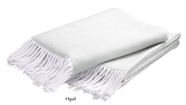 Matouk Pezzo Throw with fringes on a white background.