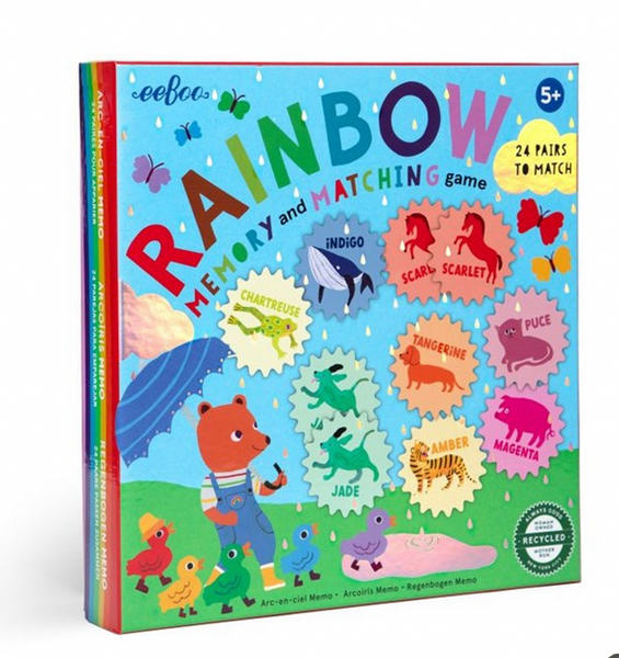 A brightly colored box of the "eeboo Rainbow Memory Matching Game" by Eeboo features illustrations of various colored animals and text indicating it contains 24 pairs to match. Perfect for ages 5 and up, this matching game is excellent for color recognition and vocabulary building.