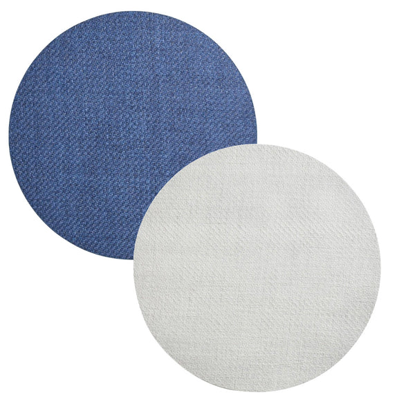 Two round Kim Seybert Saigon Placemats, one in blue and one in white, lie side by side on a white background, reminiscent of the delicate and intricate Vietnamese plaiting technique.