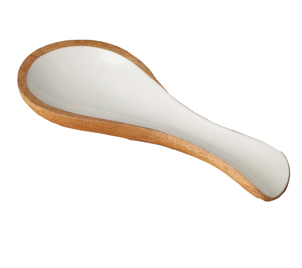 A white ceramic soup spoon with a wooden exterior, viewed from a slightly angled top perspective, rests gracefully on a Be Home Madras Spoon Rest. Handcrafted and sustainably sourced, this elegant piece enhances any dining setting by Be Home.