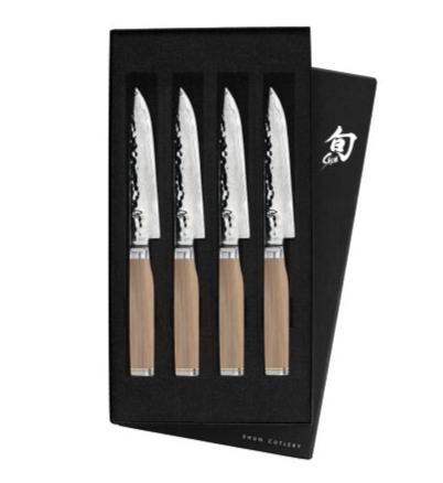 The Shun Premier Blonde Steak Knife Set, 4-Piece by Shun, comes elegantly presented in an open black box and features wooden handles paired with a VG-MAX cutting core for precision and durability.