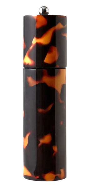 The Addison Ross Faux Tortoise Salt or Pepper Grinder by Addison Ross is a tall, cylindrical container with a faux tortoise shell pattern, featuring a small round knob on top and an efficient ceramic grinding mechanism.