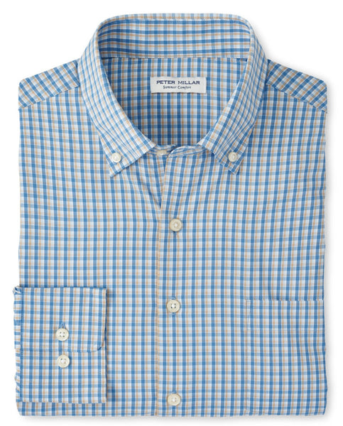 Folded Peter Millar Ashbury Performance Twill Sport Shirt for men, featuring a blue, brown, and white plaid pattern and crafted from durable performance twill fabric.