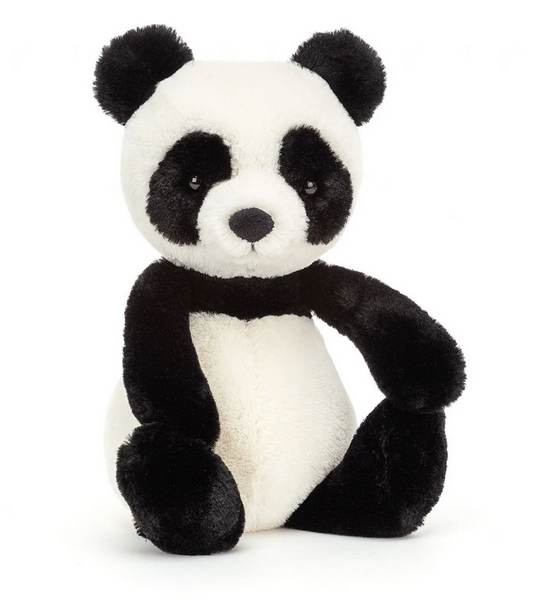 The Jellycat Bashful Panda, Medium, a stuffed panda toy with black and white fur, sits upright on a white background. Perfect for any panda lover, this adorable cuddle companion from Jellycat is ready to be your new favorite snuggle buddy.