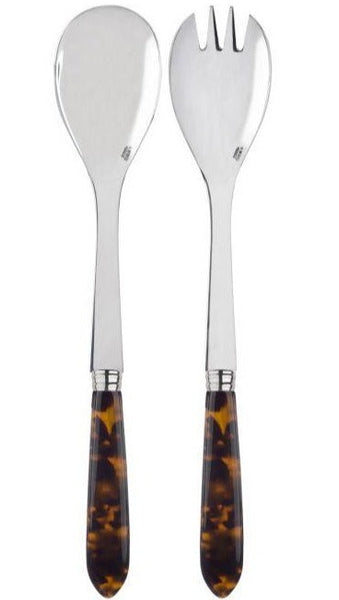 Two serving utensils with polished metal heads and dark, patterned acrylic handles. One is a spoon; the other is a fork with three prongs. Perfect for your **Sabre Tortoise Salad Set** by **Sabre** during summer salads.