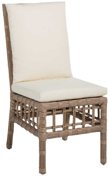 The Newport Side Chair with Rollo Natural with Welt from Summer Classics is a wooden woven chair featuring a high backrest and white cushions on the seat and back, reminiscent of vintage rattan furniture.