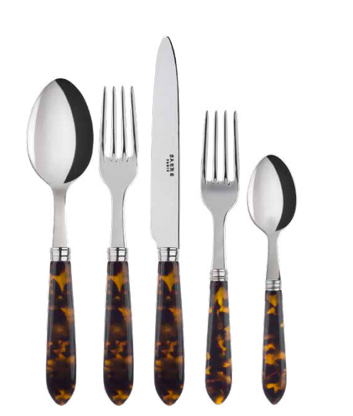 The Sabre Tortoise 5 Piece Flatware Set, imported from Paris, features a large spoon, a dinner fork, a knife, a salad fork, and a small spoon—all with elegant tortoise shell patterned handles. This dishwasher safe cutlery collection effortlessly combines style and practicality.