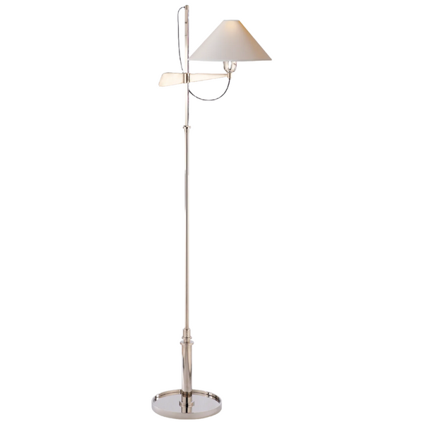 The Hargett Bridge Arm Floor Lamp by Visual Comfort features a polished nickel finish, an adjustable arm, and a natural paper shade with an extension for added height.